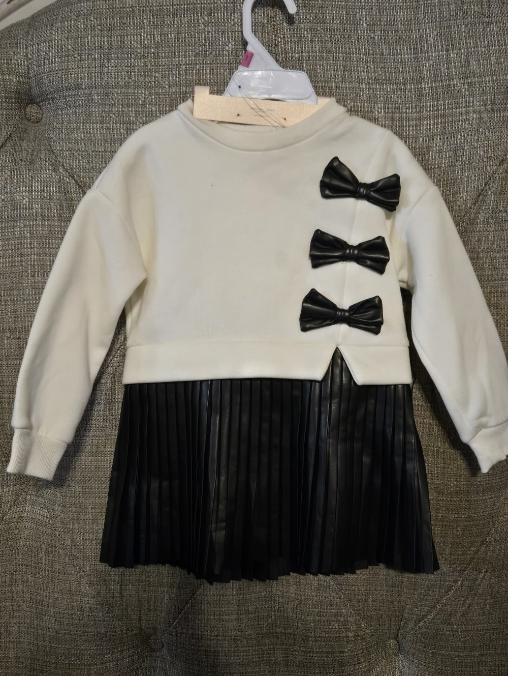2t Paris Hilton Cream Top with Black Pleated Faux-Leather Skirt